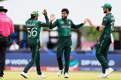 Mohammad Amir celebrates George Dockrell's wicket